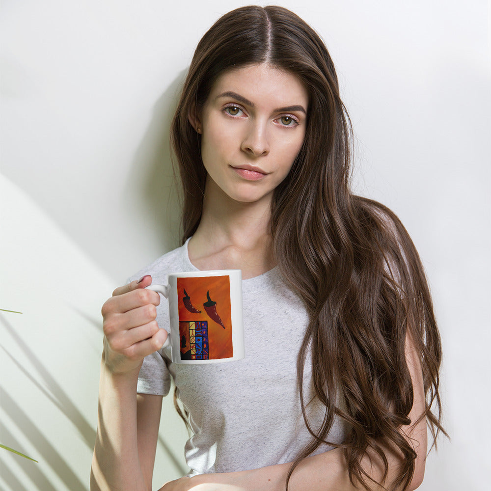 White glossy coffee mug, 11 oz held by a woman